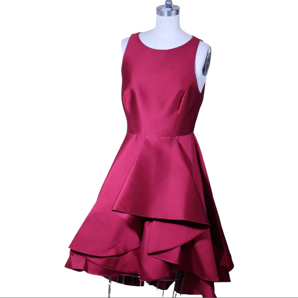 Halston Heritage fits true to size. Worn once. Mint condition